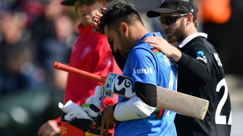 Rashid underwent a concussion test and thereafter it was decided that he would not take the field for the remainder of the game. (Photo: AFP)