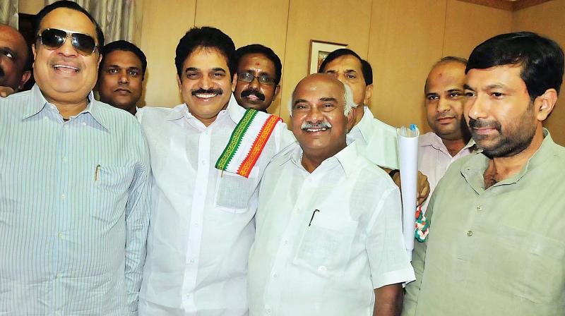 Image result for All-India Congress Committee team led by K.C. Venugopal with Siddaramaiah