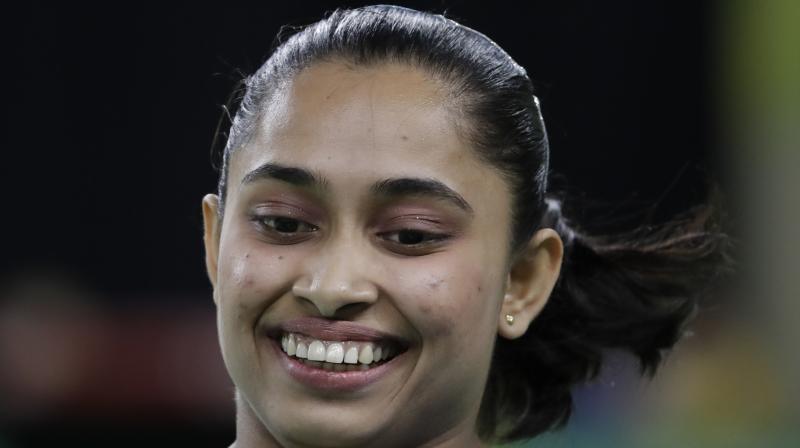 â€œI would just like to tell the young athletes to work hard and do something good for themselves,â€said Dipa Karmakar, who became the first Indian woman to gymnast to qualify for the Olympics. (Photo: AP)