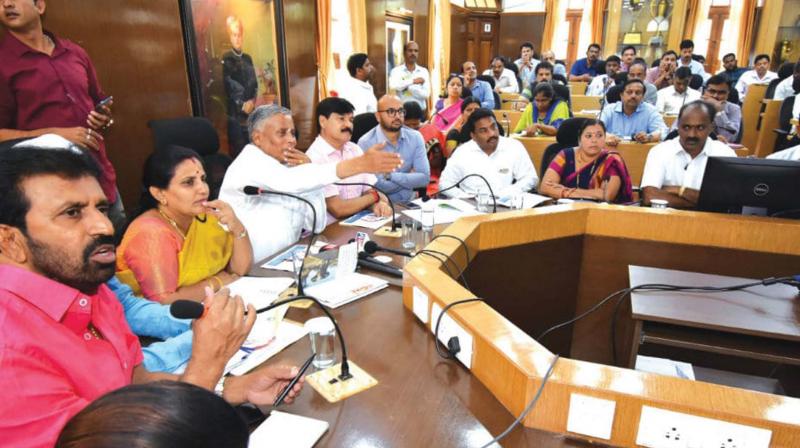 Mysuru district in-charge Minister V. Somanna presides over a meeting with contractors ahead of Dasara