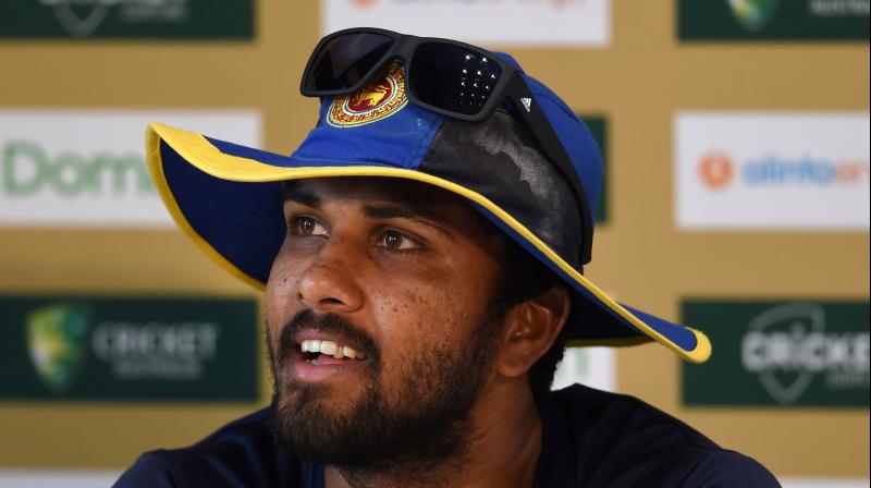 Sri Lanka Cricket says on Tuesday opening batsman Dimuth Karunaratne is the stand-in captain of a 17-man squad for the two-test series starting on Feb. 13. (Photo: AFP)