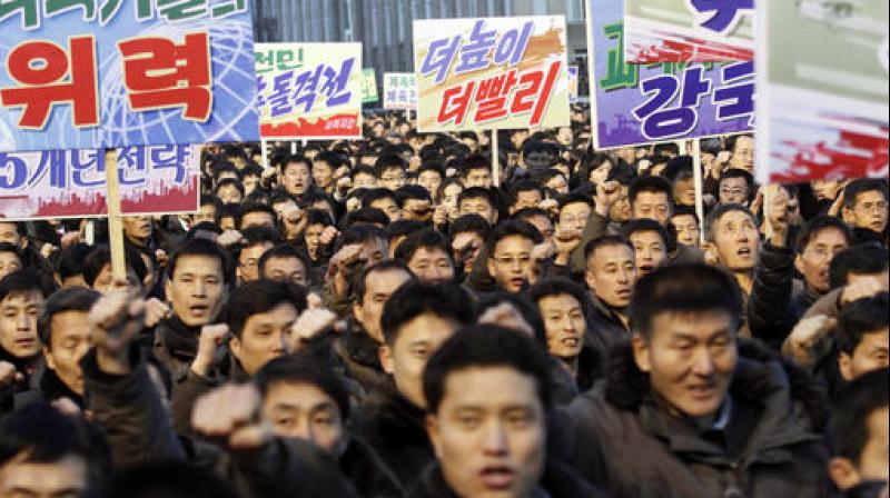 North Koreans gather during a mass rally to vow to carry through the tasks set forth by North Korean leader Kim Jong Un in his New Years address, at Kim Il Sung Square in Pyongyang. (Photo: AP)