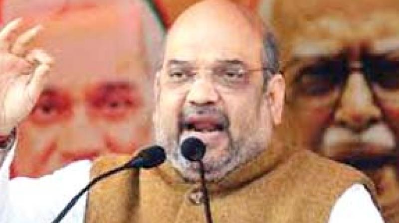 Only Modi can protect country\s borders, Cong can\t: Shah in Assam