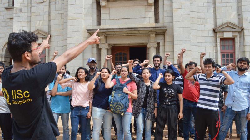 IISc scholars and students protest in Bengaluru on Wednesday.  (DC)