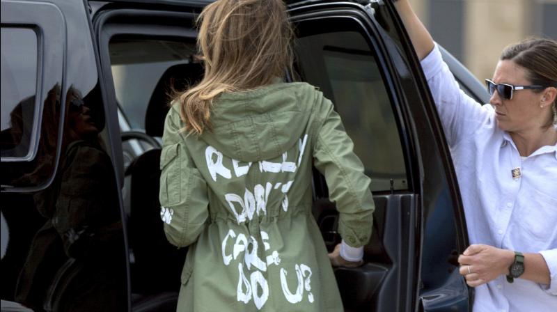 The military-style jacket with large white brush-style lettering is apparently sold for USD 39 at Zara. (Photo: AP)