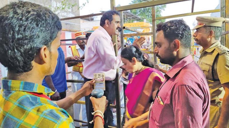 Collector turns into security guard at Kancheepuram temple