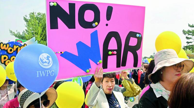 Members of the South Korean womens peace group participate in a rally to support the upcoming inter-Korea summit, at Imjingak peace park in Paju near the demilitarised zone dividing the two Koreas on Thursday. (Photo: AFP)