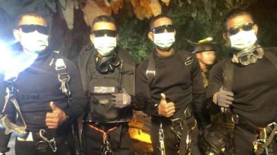 Thailand's Navy SEALs, who were central to the rescue effort, celebrated the feat with a post that read: "All the thirteen Wild Boars are now out of the cave," - a reference to the boys' soccer team. "We are not sure if this is a miracle, a science, or what." (Photo: AP)