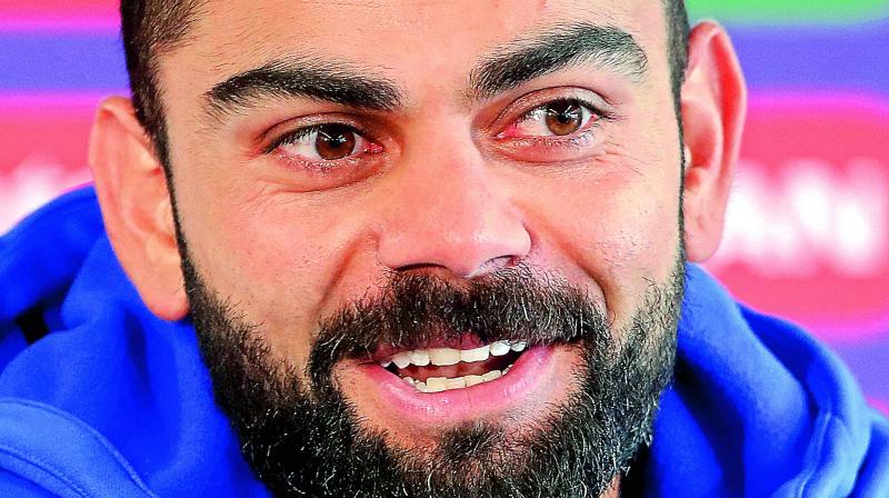 Virat Kohli is happy to play second fiddle