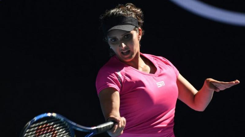 Indias Sania Mirza and her Kazakhstani partner Yaroslava Shvedova suffered a major blow as they slumped to a first round defeat against Russian pair of Daria Gavrilova and Anastasia Pavlyuchenkova 6-7 (5), 6-1, 2-6 in the womens doubles category. (Photo: AFP)