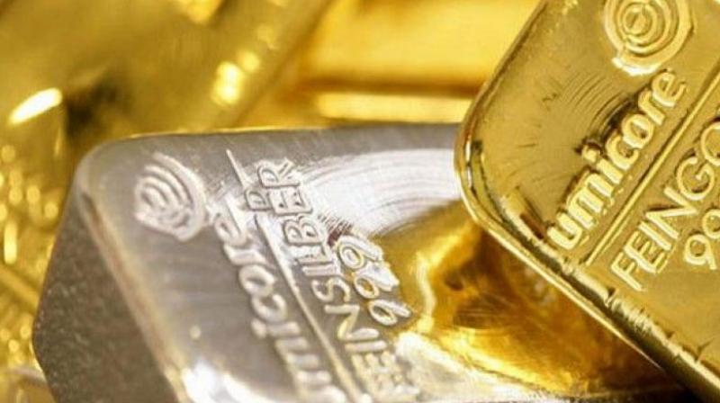 Globally, gold fell 0.17 per cent to trade at USD 1,265.90 an ounce in Singapore, while silver shed 0.34 per cent to USD 17.53 an ounce.