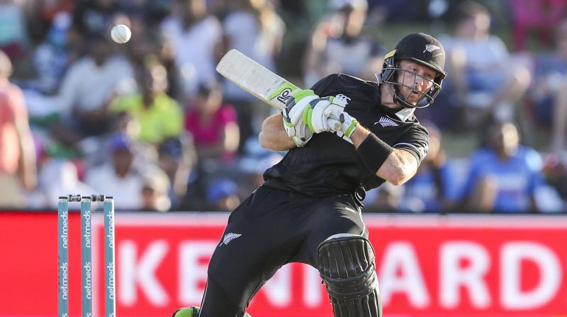 Guptill looked in pain as he walked off the ground with the help of New Zealand physiotherapist Vijay Vallabh and security manager Terry Minish. (Photo: AP)