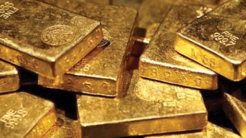 Gold gains Rs 100 on jewellers\ buying