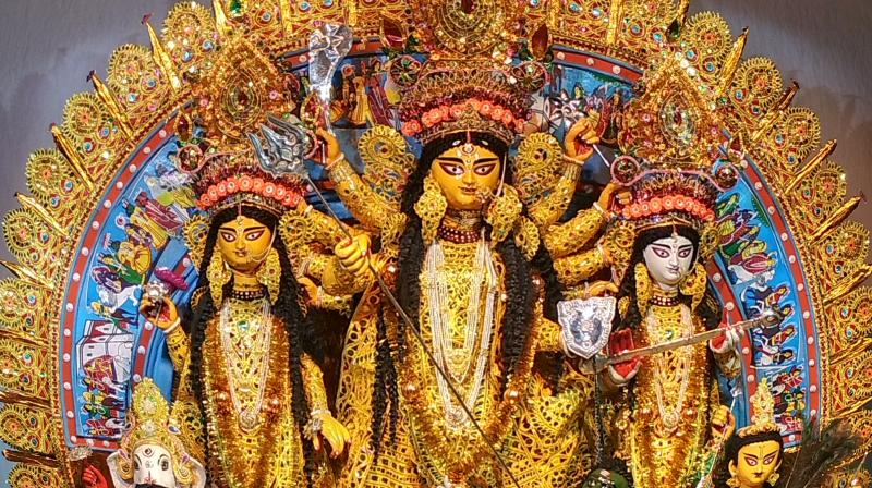 Durga Puja fever grips Kolkata as pandal hoppers share candid moments from the city
