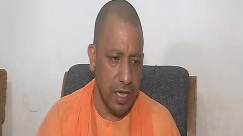 Uttar Pradesh Chief Minister Yogi Adityanath, while taking part in the Jan Raksha Yatra in Kerala, said the rally intends to show a mirror to the governments of Kerala. (Photo: ANI/Twitter)