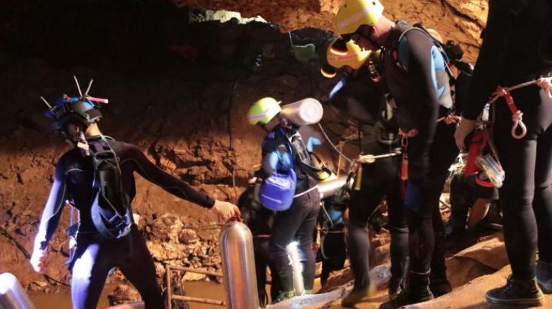 The boys were guided by expert divers who plotted the hours-long escape through more than four kilometres of twisting passageways and flooded chambers. (Photo: AP)