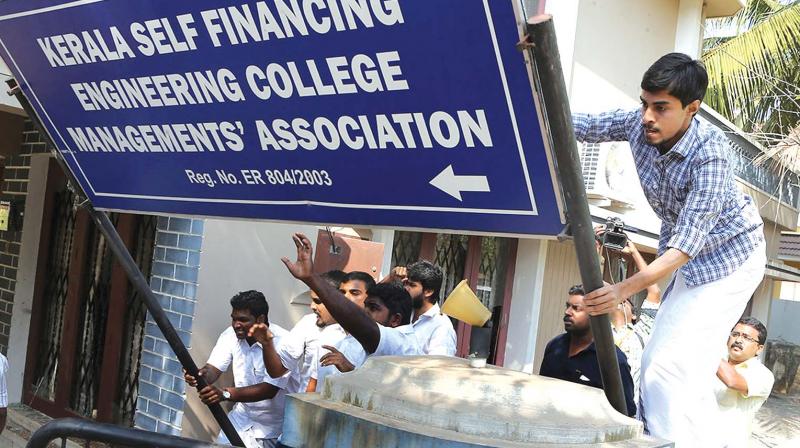 KSU activists attack Kerala Self Financing Engineering College Managements Association office at Kunadannoor in Kochi on Wednesday. (Photo: Sunoj Ninan Mathew)