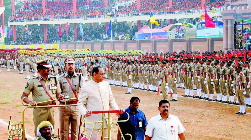 Governor E.S.L. Narasimhan receives a guard of honour at the IGMC stadium on the occasion of Republic Day celebrations in Vijayawada on Thursday. (Photo:  DC)