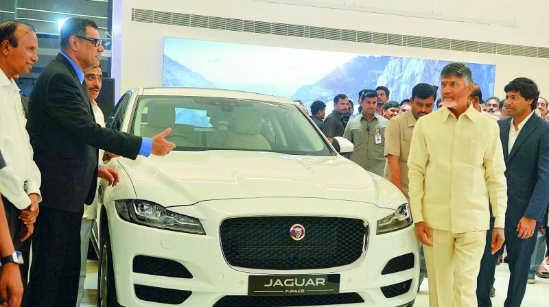 Chief Minister N. Chandrababu Naidu inaugurates a new car showroom near DGP office on Thursday.