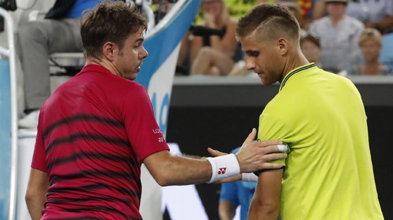 The World Number 3 Stanislas Wawrinka apologised to Martin Klizan saying, \Im sorry I touch him in the wrong place.  (Photo: AP)