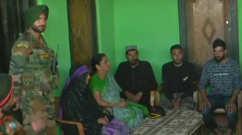 Defence Minister Nirmala Sitharaman went to the remote hamlet of Salani border to express her condolences to the family of Aurangzeb. (Photo: Twitter/ANI)