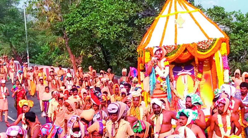 Devotees take part in a procession as part of Narasimha Deeksha at Simhachalam in Visakhapatnam. (Photo: DC)