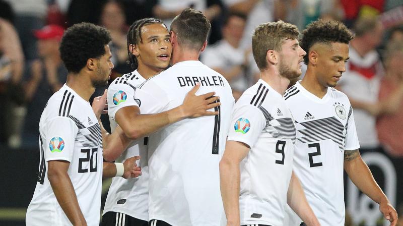 Germany crush Estonia 8-0, Northern Ireland earn late win