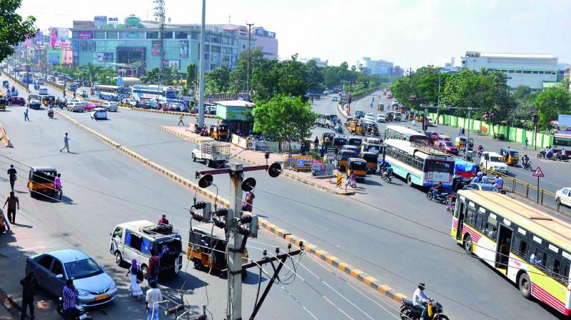 A view of the traffic at Maddilapalem junction on the National Highway in Visakhapatnam on Saturday. (Photo: DC)