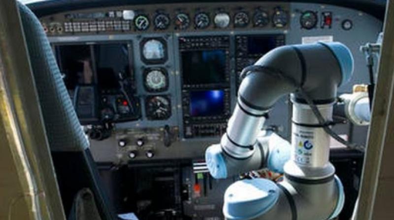 The demonstration was part of a government and industry collaboration that is attempting to replace the second human pilot in two-person flight crews with robot co-pilots.