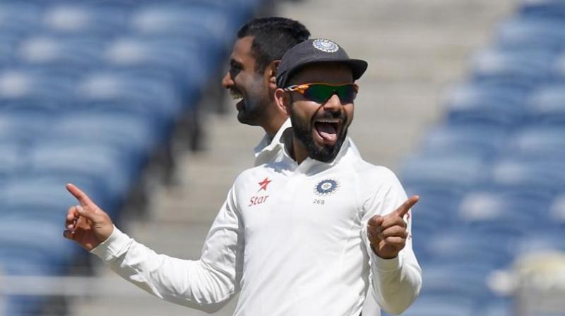 Virat Kohli made some explosive accusations after the 2nd Test that Steve Smith had been systematically abusing the DRS. (Photo: AFP)