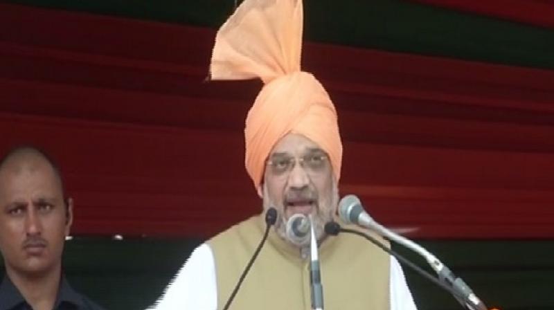 Shah talks of \Mission 75\ at Jind rally, slams Cong for not revoking Article 370