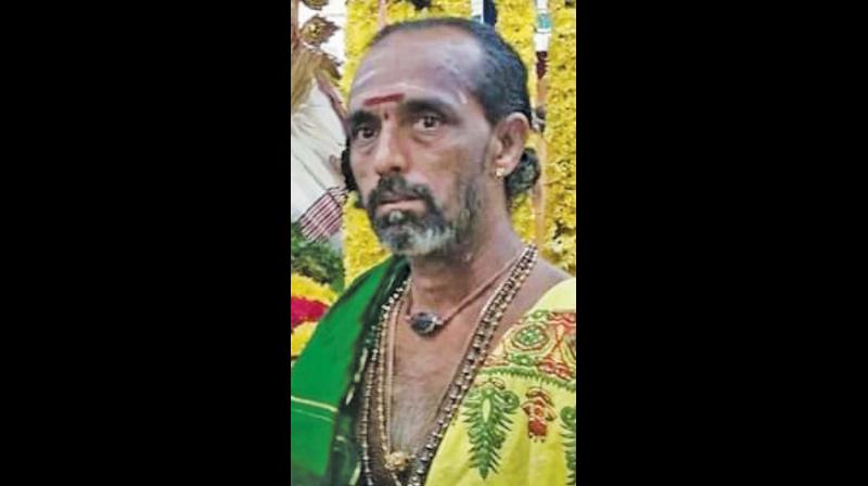 Even as priest Murali Sivachariyaar was performing the closing poojas to the deity in the temple car, he accidentally fell to the ground from a height of 15 feet.