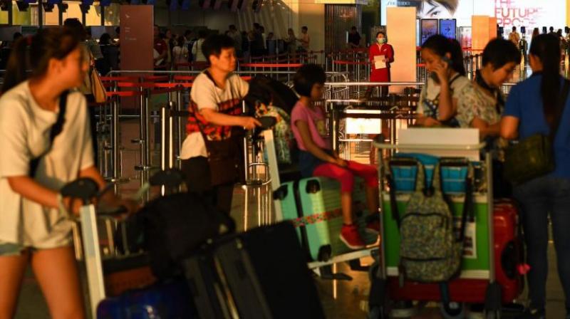 More than 200 flights cancelled at Hong Kong airport as ops resume after protest
