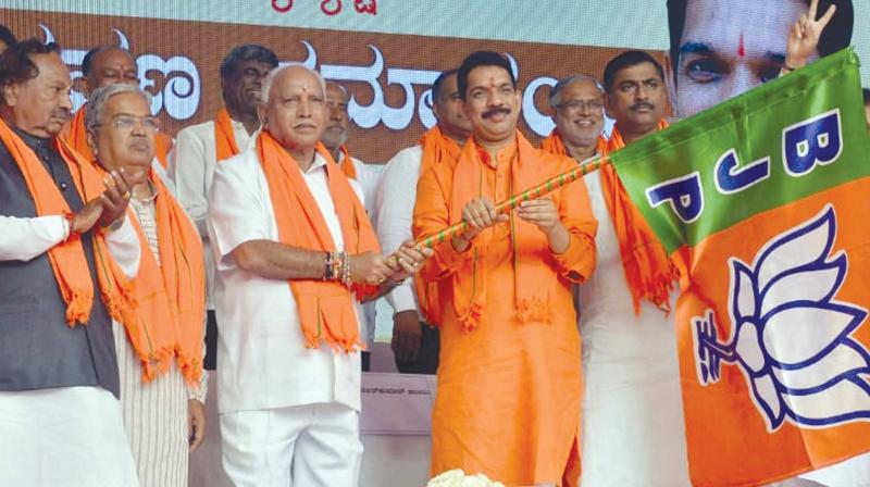 A file photo of Chief Minister B.S. Yediyurappa along with BJP president Nalin Kumar Kateel. (Photo: KPN)