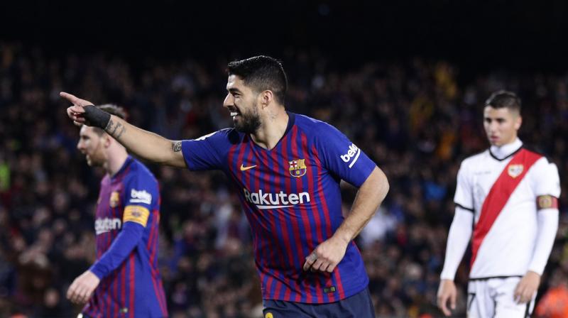 Barcelona came from behind to beat Rayo Vallecano, ahead of their crunch Champions League second leg against Lyon. (Photo: AP)