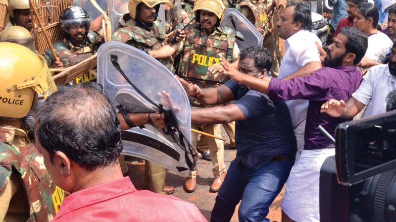 BJP activists clash with police after the partys Secretariat march turned violent in Thiruvananthapuram on Monday. (Photo:DC)