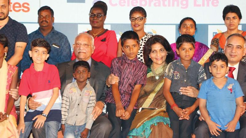 Bone marrow transplant survivors along with Apollo chairman Prathap C. Reddy and vice-chairman Preetha Reddy at the function to mark completion of 1,500 bone marrow  transplants by Apollo Hospitals on Wednesday.	(Photo:DC)