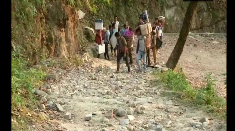 Polling teams trek 10kms to conduct voting in West Bengalâ€™s Buxa hills