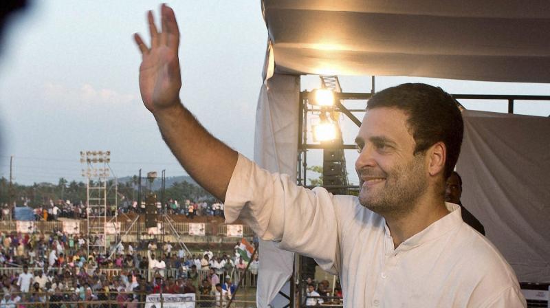 Congress Vice President Rahul Gandhis waves to the crowd during his Padyatra from Holy Sprit Church to Fatorda Ground at Margaon in Goa. (Photo: PTI)