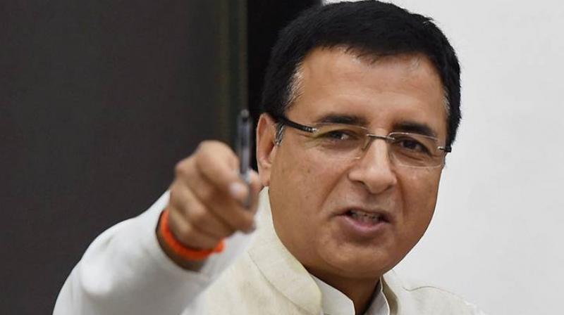 Congress leader Randeep Singh Surjewala said that the BJP is hatching a conspiracy to shield the Haryana state chiefs son, who harassed and stalked an IAS officers daughter in an alleged inebriated state in Chandigarh. (Photo: PTI)