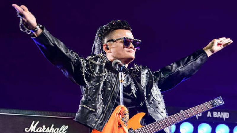 Tearful Jack Ma bids farewell to Alibaba with rock star show
