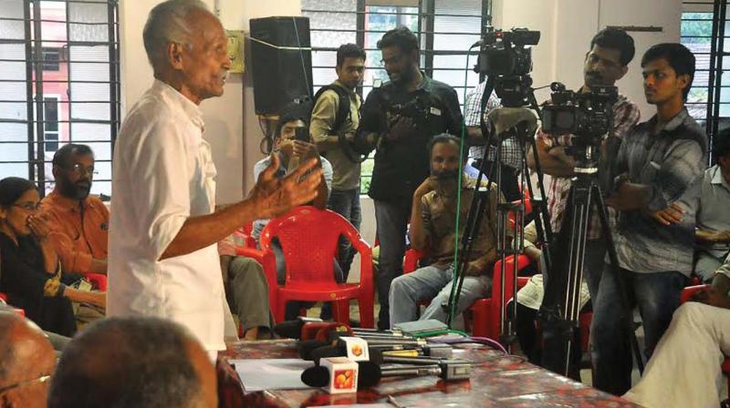 Human rights activist Grow Vasu addressing a  meeting of activists held to seek legal remedies in the encounter killing of two Maoists in Nilambur forests and ongoing torture of human rights activists since, at Kozhikode on Tuesday. (Photo: DC)