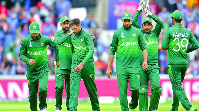 Pakistan players during their loss to India in Manchester on Sunday.