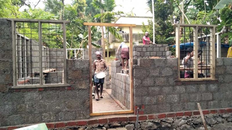 A nodal institution has to be established as a delivery system for single window back-up services for affordable housing in each district. (In Pic): A house under construction for a flood victim in Ernakulam district.