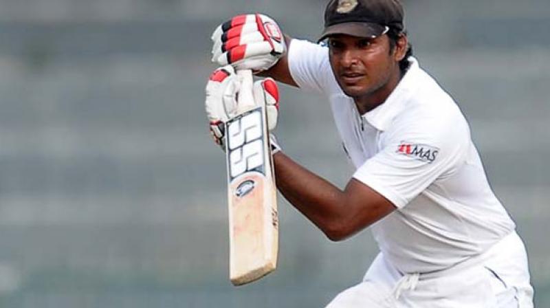 Sangakkara reached his sixth century in only his eleventh innings off 136 balls with 12 fours and a six. (Photo:AFP)