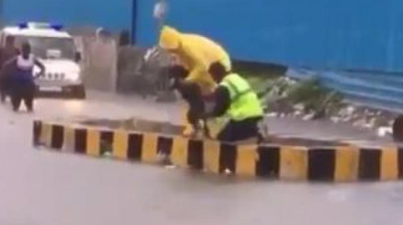 Mumbai Police officer rescues dog from flood water; watch video