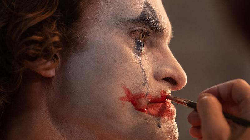 Joaquin Phoenix defends \Joker\ as families of shooting victims voice concern