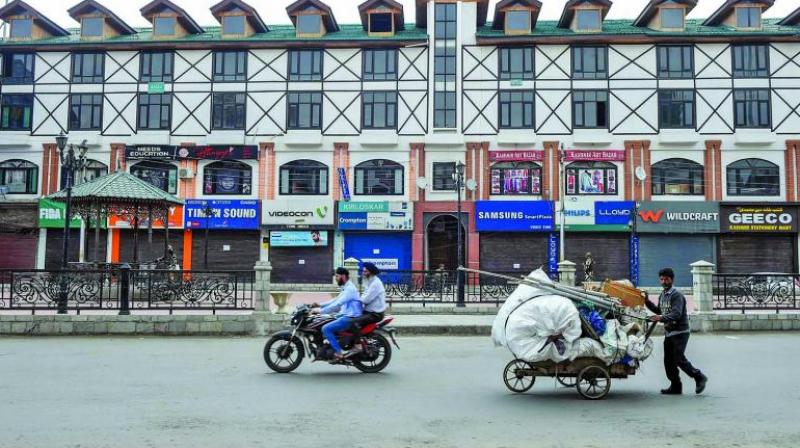 A view of A deserted Lal Chowk area in Srinagar Wednesday. (Photo: PTI)