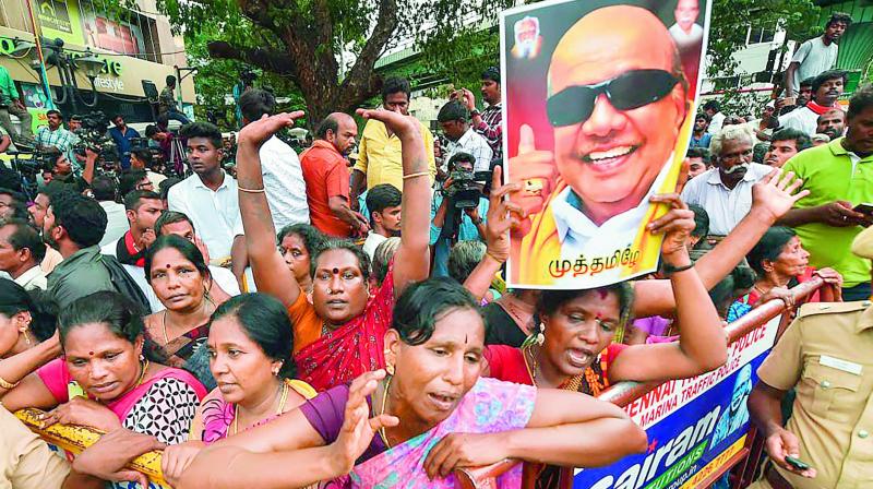 DMK supporters at Kauvery Hospital react after they hear the news of DMK president M. Karunanidhis demise. (Photo: PTI)