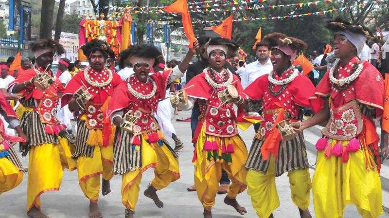 Folk artistes perform during Chhatrapati Shivaji Jayanti celebrations in Bengaluru on Sunday. (Photo: KPN)